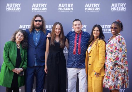 Yancey Burns stands with a group of people at a film festival